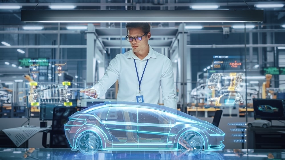 An engineer in a clean white shirt in a futuristic lab designing an electric car using hologram technology.