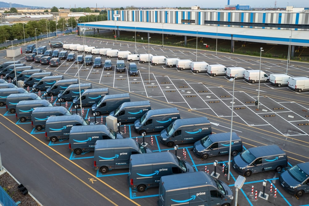 A fleet of Amazon electric LCV at their depot.