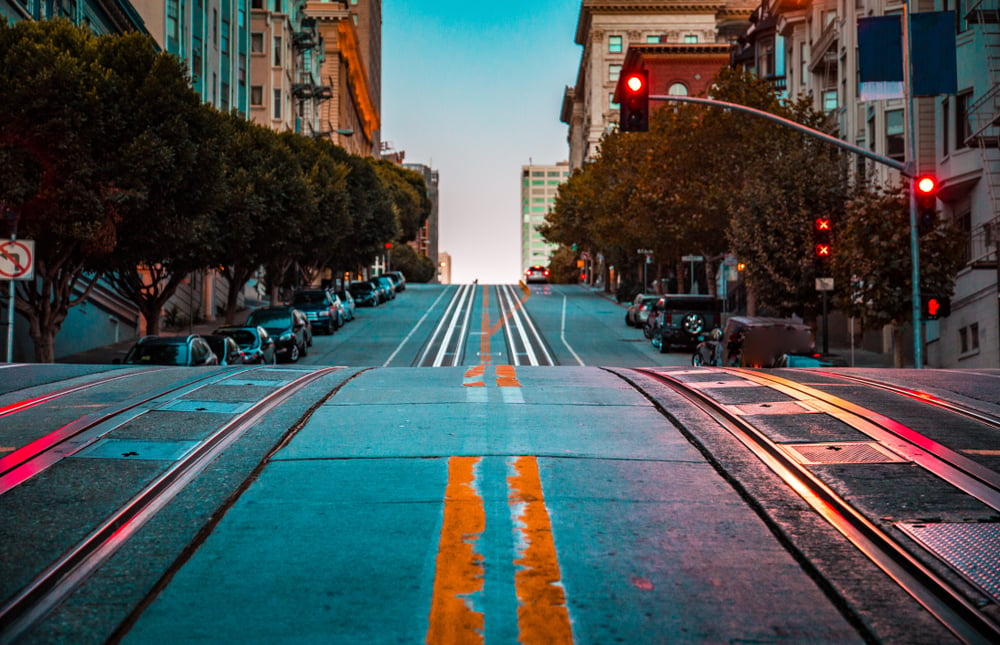 A day-time view of a street in San Fransisco, CA.