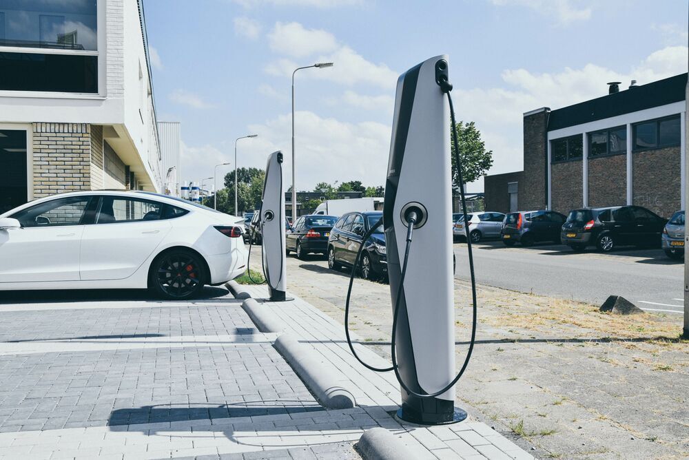EVBox charging station in car park.
