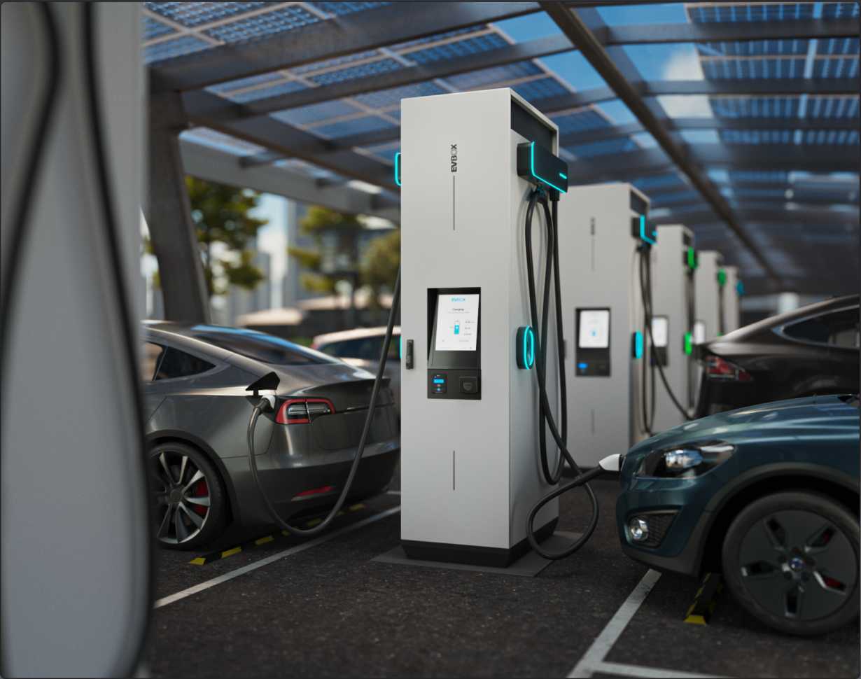 A line of fast charging stations actively charging the EV's connected to them.