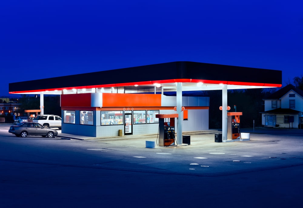 A gas station at night 